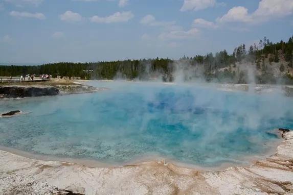 Thermophilic, or heat-loving, bacteria inhabit hot springs like this one in Yellowstone National Park and often have high GC contents in their DNA to withstand the scalding temperatures. (Image via Shutterstock)