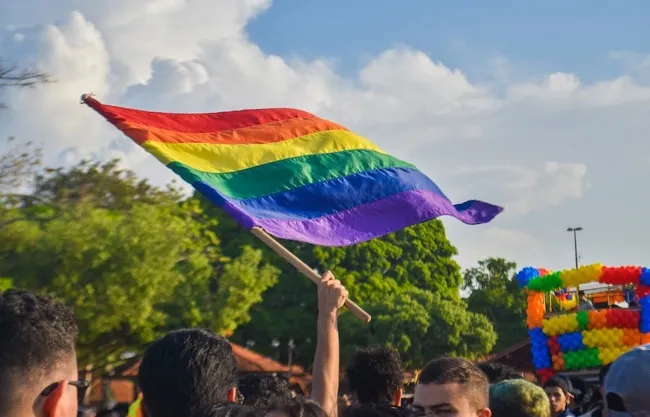 People may feel more comfortable coming out in safe spaces and supportive environments. People who don’t identify as LGTBQIA+ but support the community are called allies. (Image from Wikimedia)